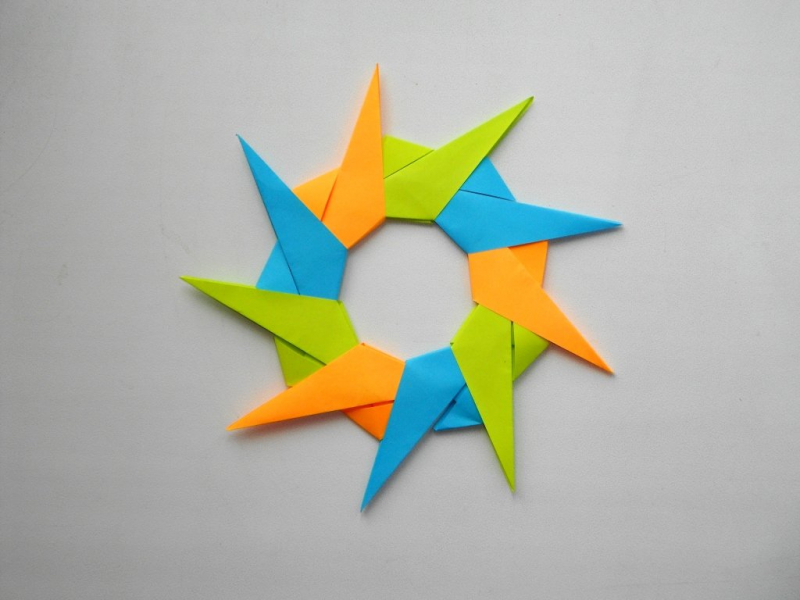 Звезда из бумаги. Новогоднее елочное украшение — оригами игрушка в фото